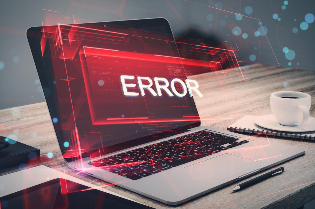 Laptop screen displaying a glowing red "ERROR" hologram, symbolizing a technical issue or broken layout during website page creation.